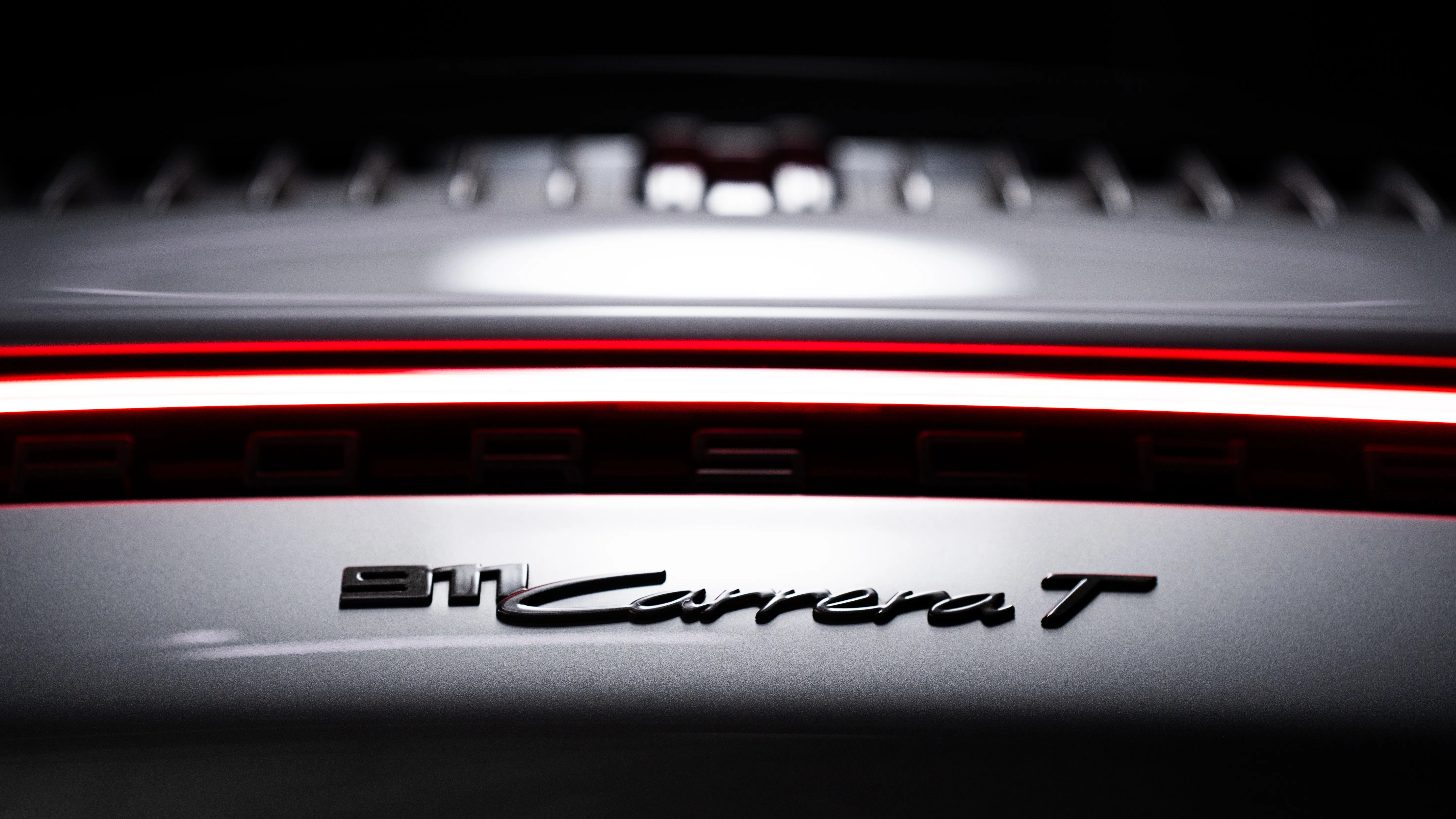 Porsche 992 Carrera T on lift in climate-controlled storage